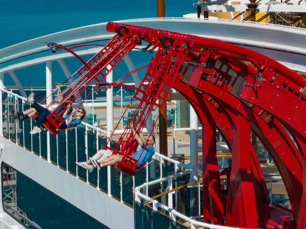 The Cliffhanger - the only over-water swing ride at sea - has been unveiled on the top deck of MSC Cruises’ MSC World America.
Nestled in the heart of the ship’s Family Aventura district, 50 meters above the ocean, the swing beckons thrill seekers looking for a rush
of excitement.